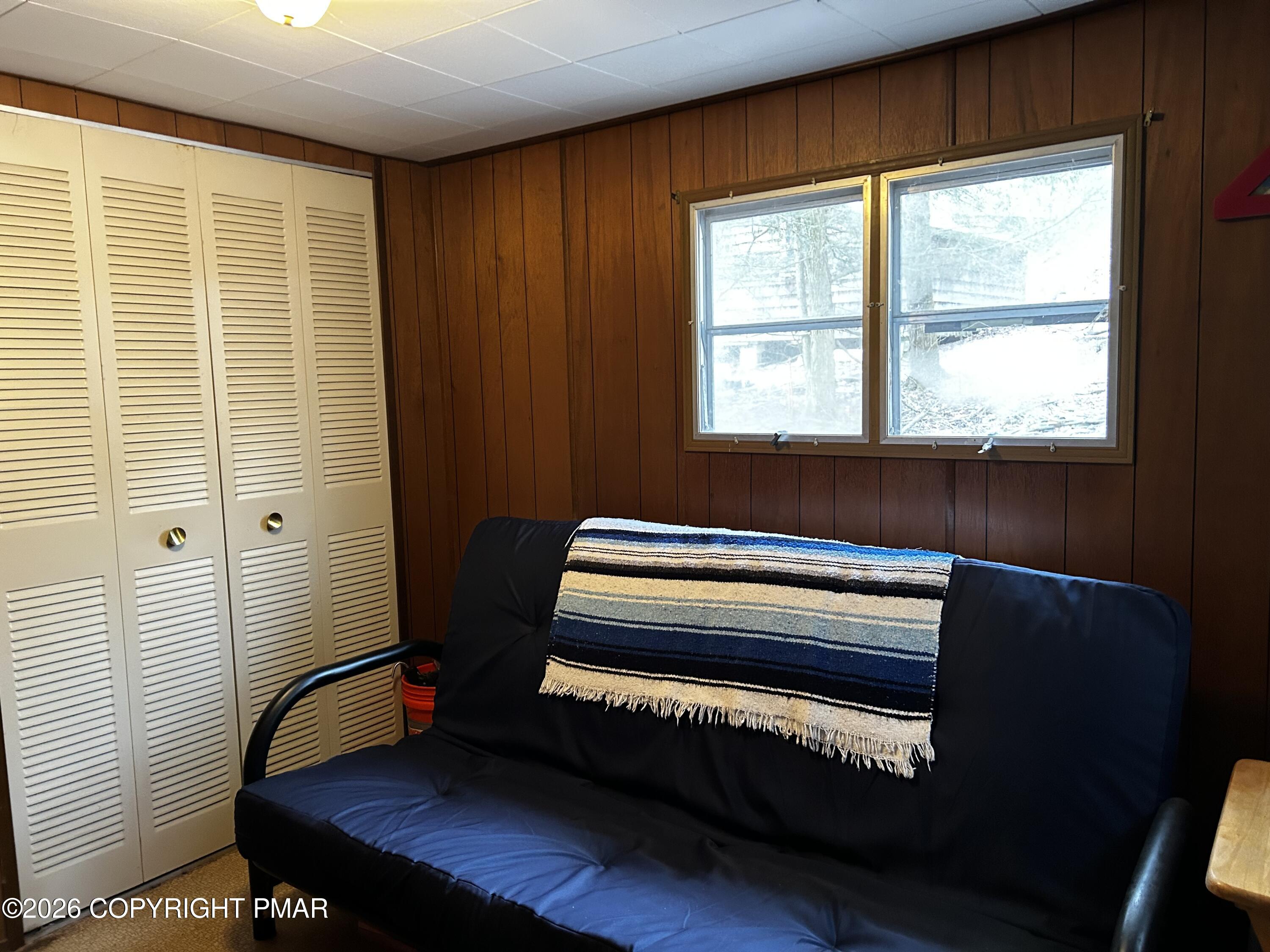 255 Buck Fever Trail Scotrun, PA 18355 - Photo 9 of 27 a room with a bed and a window