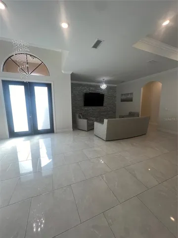 a view of a hallway with stairs