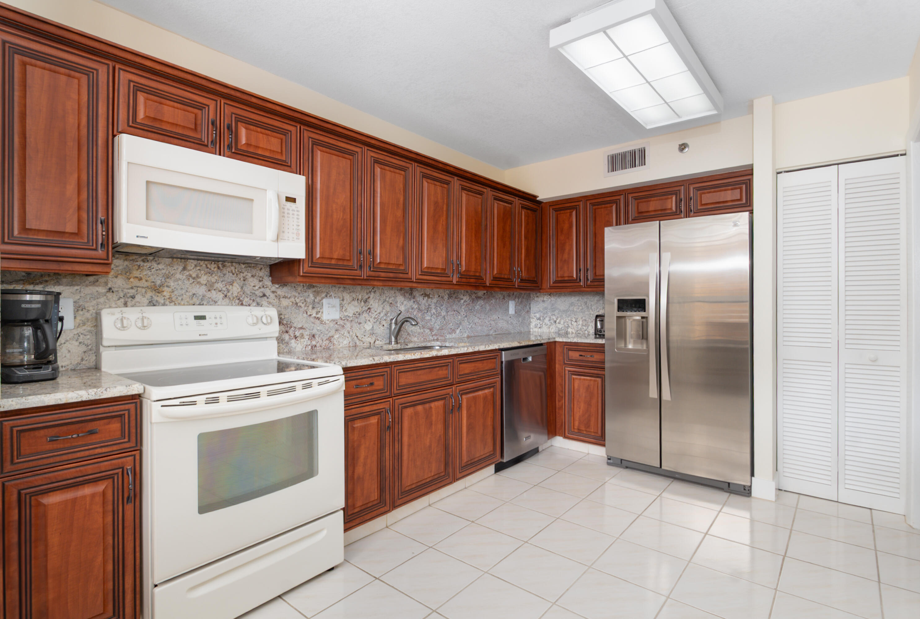 7153 Promenade Drive, Unit 601 Boca Raton, FL 33433 - Photo 11 of 47 updated kitchen