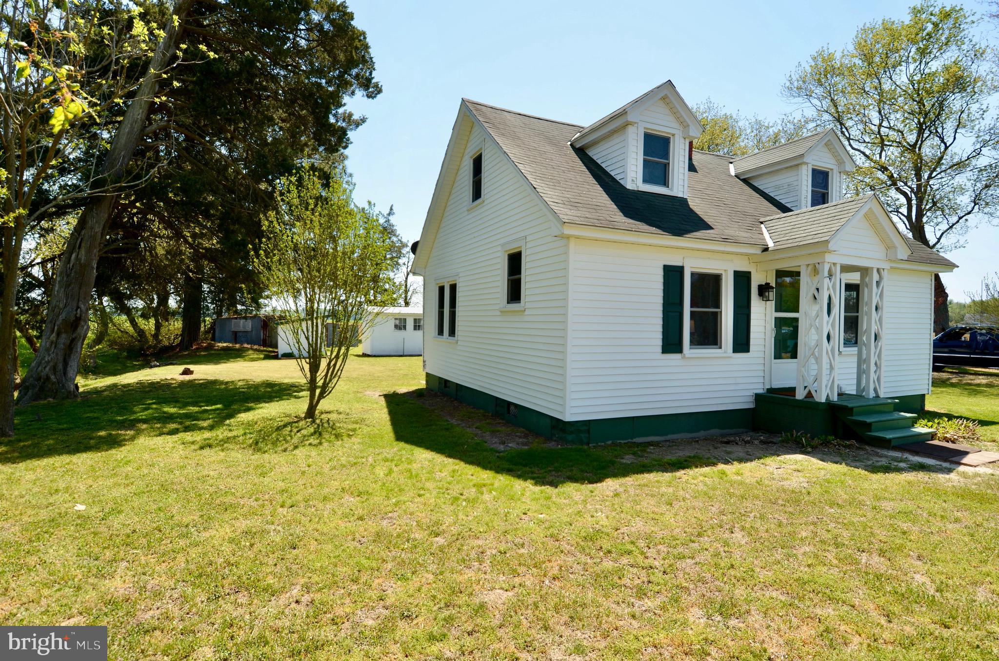 30023 Deal Island Road Princess Anne, MD 21853 - Photo 16 of 25 a view of a house with a yard