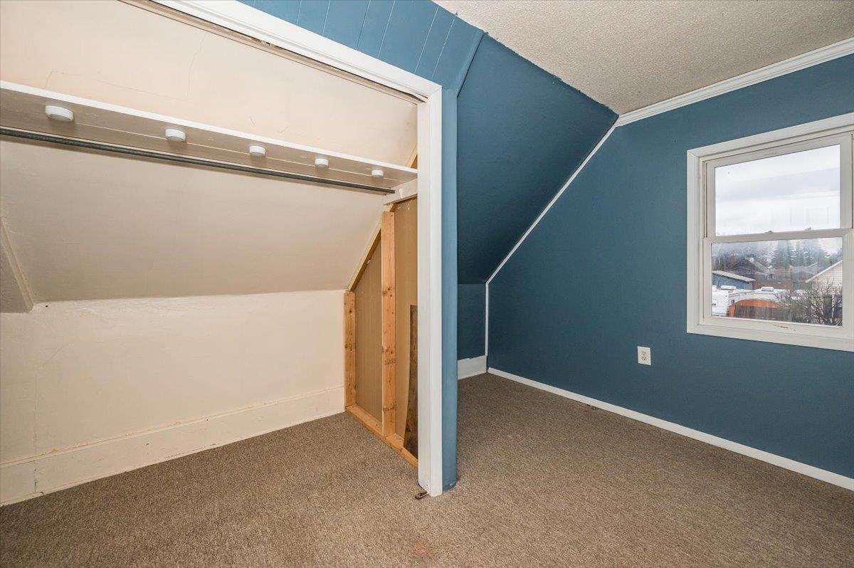 3701 East 2nd Street Superior, WI 54880 - Photo 12 of 25 Bedroom with a textured ceiling, new paint and carpet floors