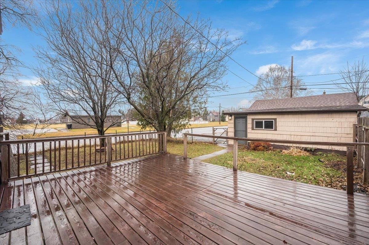 3701 East 2nd Street Superior, WI 54880 - Photo 19 of 25 Wooden deck featuring a lawn and an outdoor structure