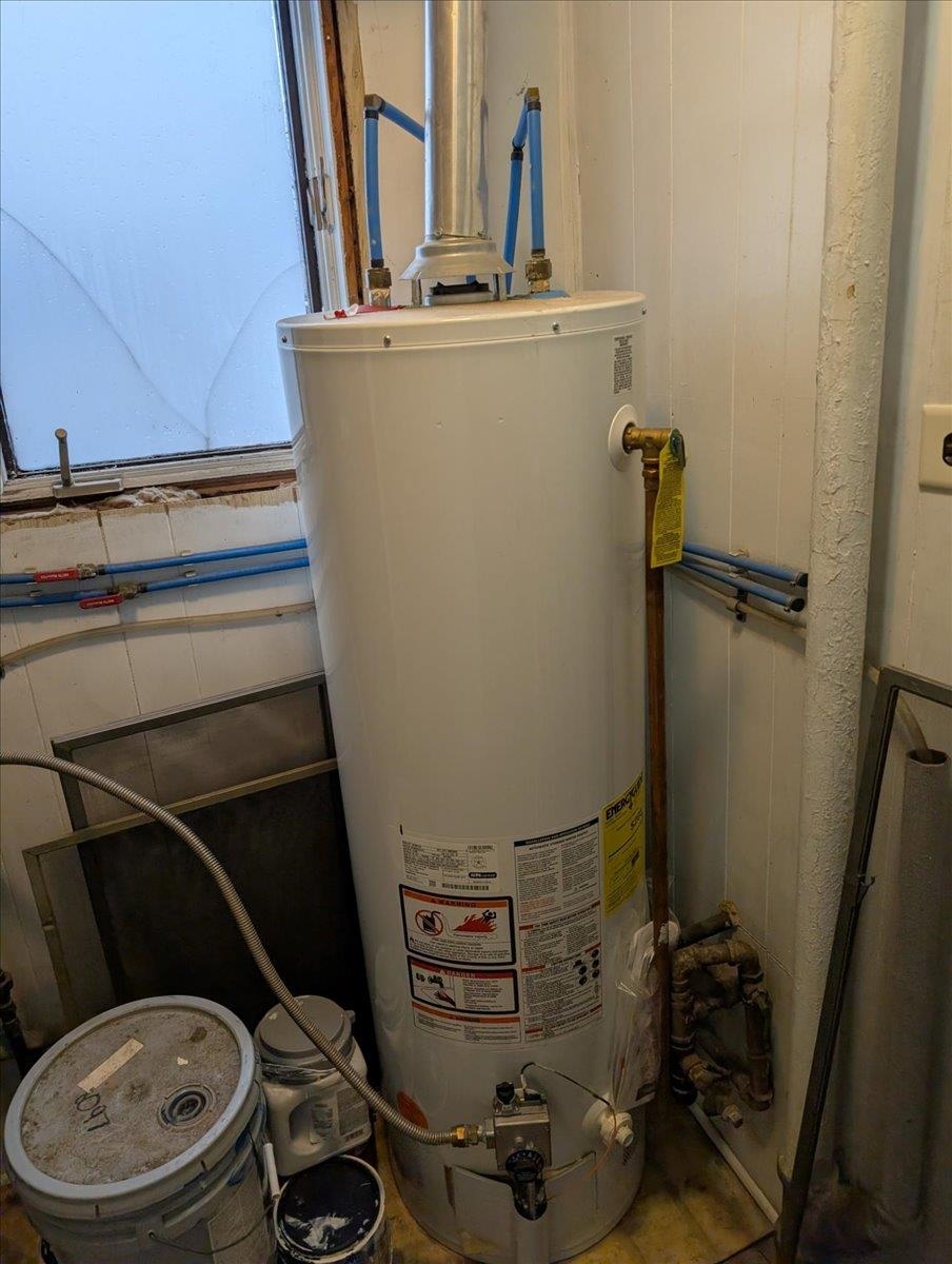 3701 East 2nd Street Superior, WI 54880 - Photo 25 of 25 Utility room with gas water heater