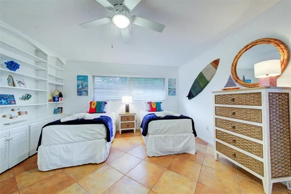 a bedroom with furniture and a bed