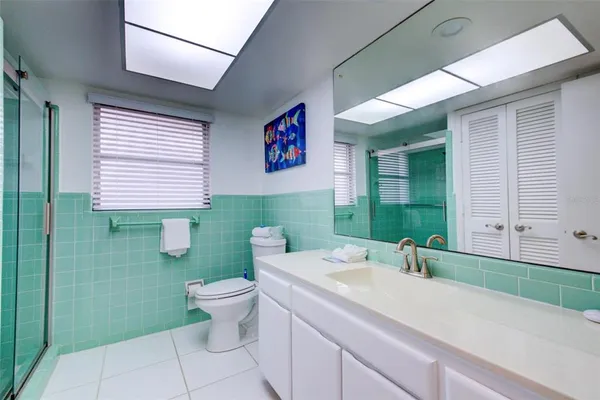 a bathroom with a sink and a toilet