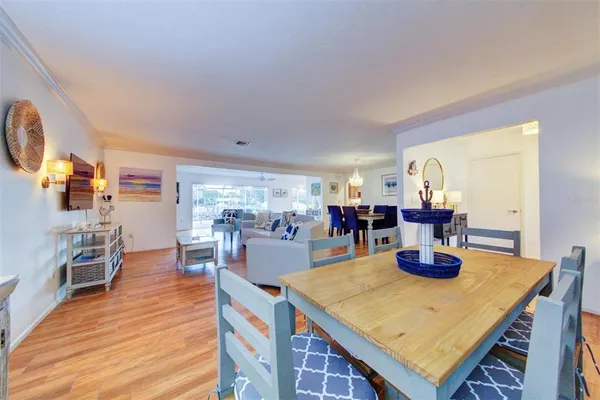 a dining room with wooden floor
