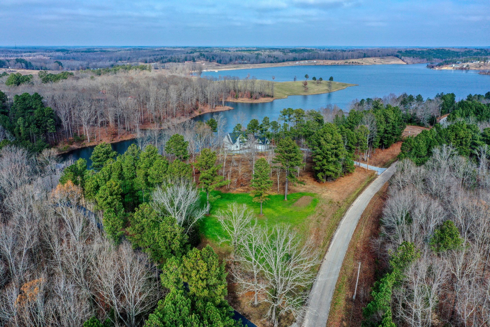 0 Reedy Creek Road Huntingdon, TN 38344 - Photo 5 of 16 a view of a lake with a city view