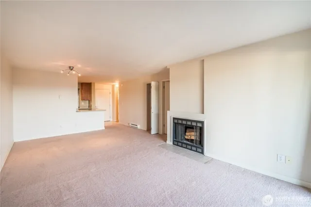 a view of a livingroom with a fireplace