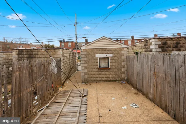 a view of a patio with a yard