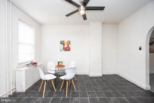 a workspace with furniture and a window