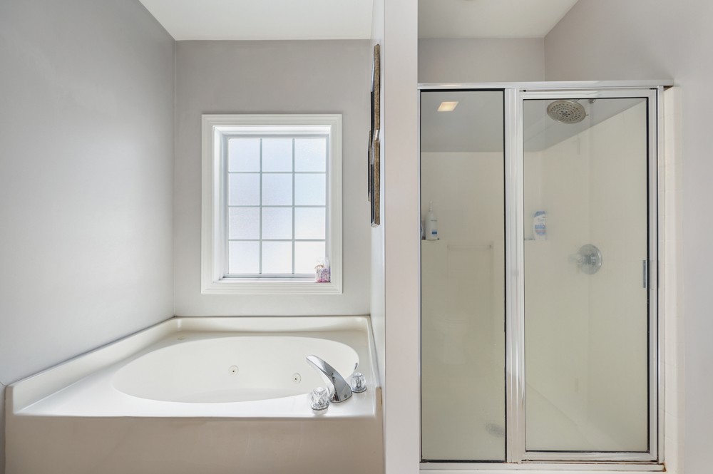 706 Deer Ridge Lane Lebanon, TN 37087 - Photo 15 of 29 a white bath tub sitting next to a window