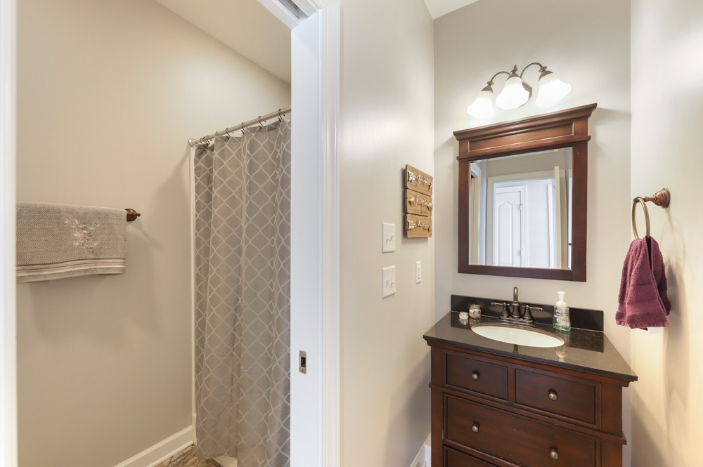 706 Deer Ridge Lane Lebanon, TN 37087 - Photo 18 of 29 a bathroom with a sink vanity and a mirror