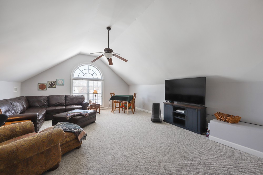 706 Deer Ridge Lane Lebanon, TN 37087 - Photo 21 of 29 a living room with furniture and a flat screen tv