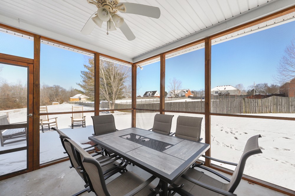 706 Deer Ridge Lane Lebanon, TN 37087 - Photo 24 of 29 a living room with furniture and a floor to ceiling window