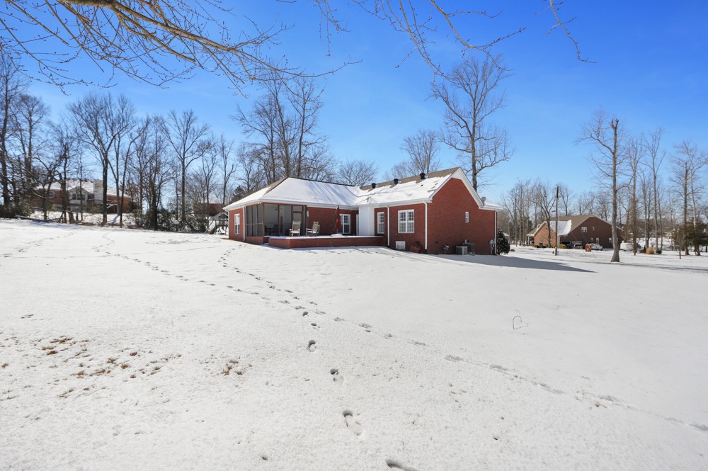 706 Deer Ridge Lane Lebanon, TN 37087 - Photo 27 of 29 a street view covered with snow