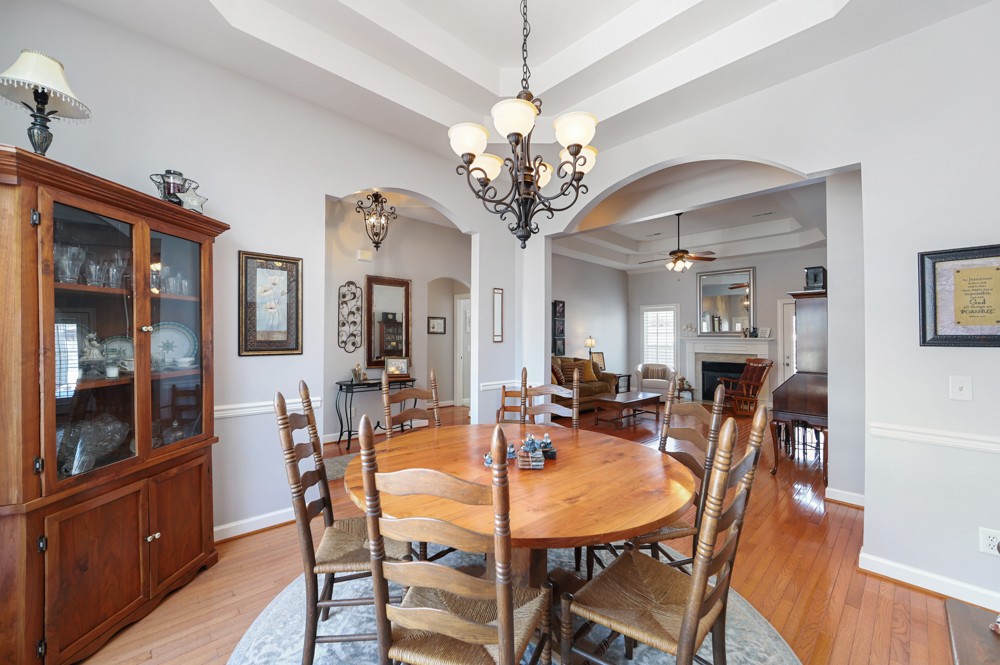 706 Deer Ridge Lane Lebanon, TN 37087 - Photo 5 of 29 a view of a dining room with furniture and wooden floor