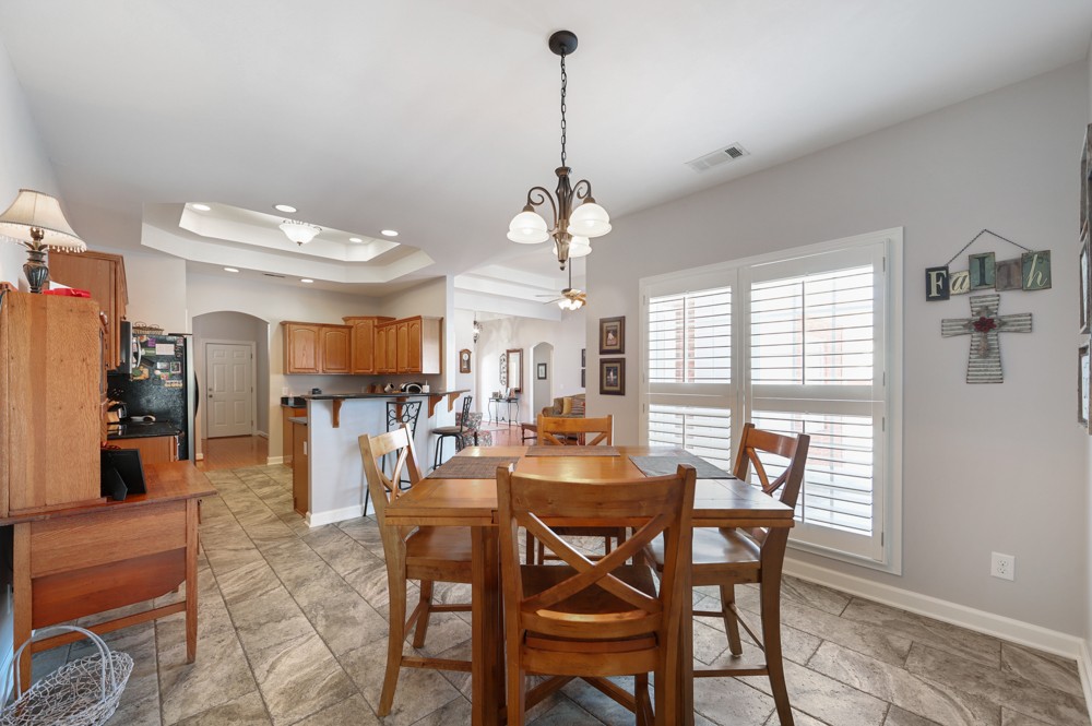 706 Deer Ridge Lane Lebanon, TN 37087 - Photo 10 of 29 a view of a dining room with furniture and window