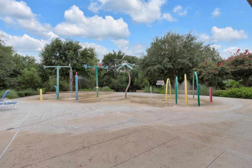 351 Wincliff Drive Buda, TX 78610 - Photo 38 of 40 A vibrant splash pad offers endless aquatic fun on warm days.