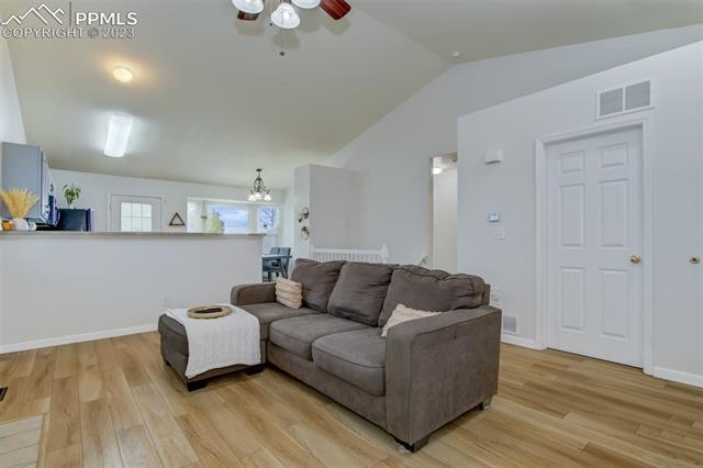 7473 Farmcrest Road Colorado Springs, CO 80925 - Photo 4 of 26 Newer LVP throughout main level great room