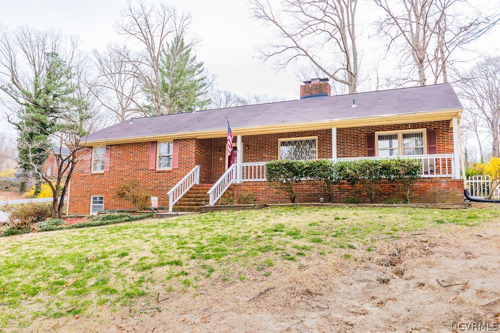 11301 Rolling Brook Road Chester, VA 23831 - Photo 1 of 49 a view of a house with a yard