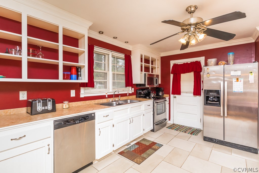 11301 Rolling Brook Road Chester, VA 23831 - Photo 13 of 49 a kitchen with a sink stove and refrigerator