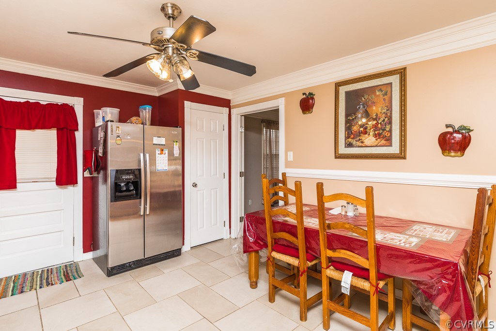 11301 Rolling Brook Road Chester, VA 23831 - Photo 14 of 49 a view of a hallway with dining area and chandelier