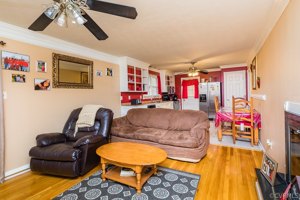 11301 Rolling Brook Road Chester, VA 23831 - Photo 16 of 49 a living room with furniture and a flat screen tv