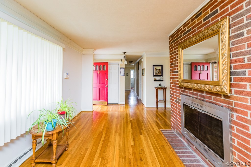11301 Rolling Brook Road Chester, VA 23831 - Photo 19 of 49 a living room with furniture and a fireplace