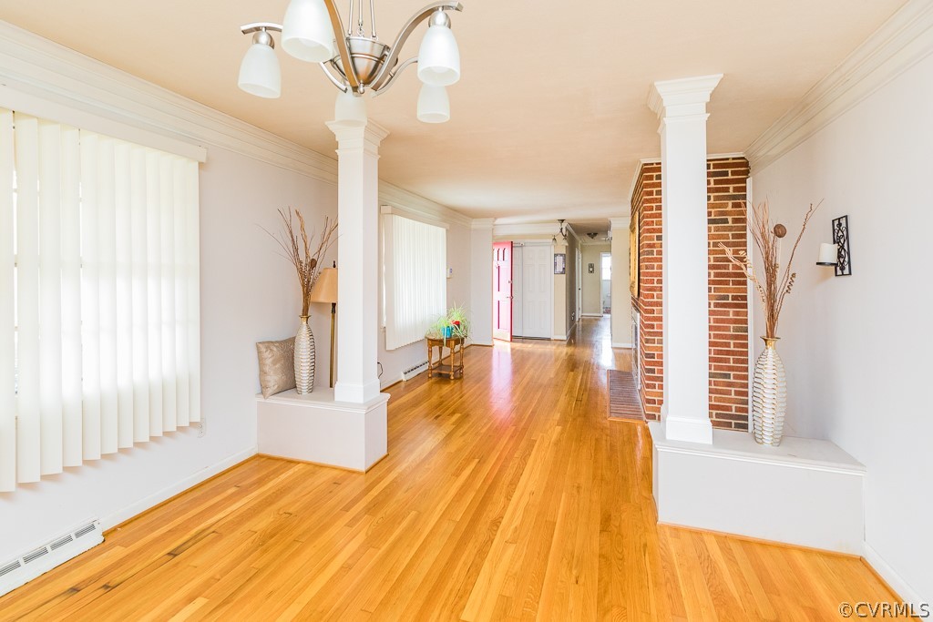 11301 Rolling Brook Road Chester, VA 23831 - Photo 23 of 49 a view of a living room with a large window and wooden floor