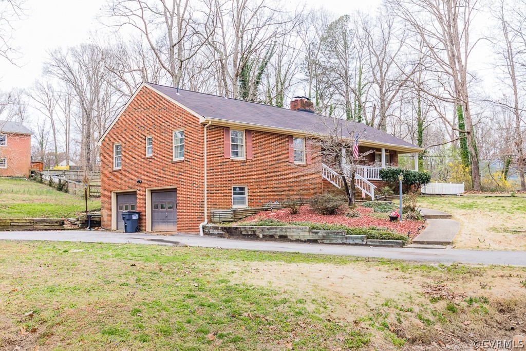 11301 Rolling Brook Road Chester, VA 23831 - Photo 45 of 49 a front view of house with yard