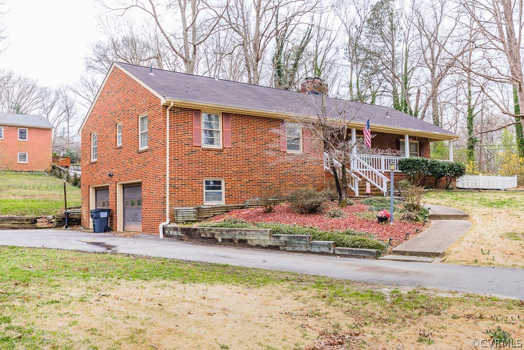 11301 Rolling Brook Road Chester, VA 23831 - Photo 46 of 49 a front view of a house with a yard
