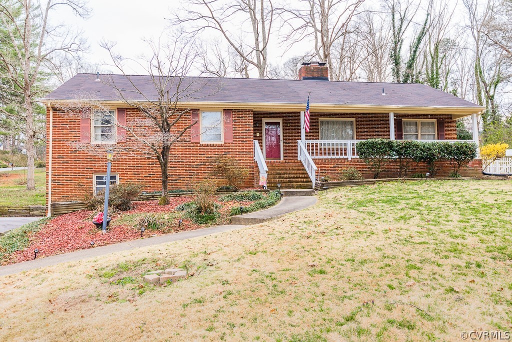 11301 Rolling Brook Road Chester, VA 23831 - Photo 48 of 49 a front view of a house with garden