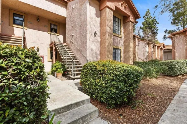 a view of a garden with pathway