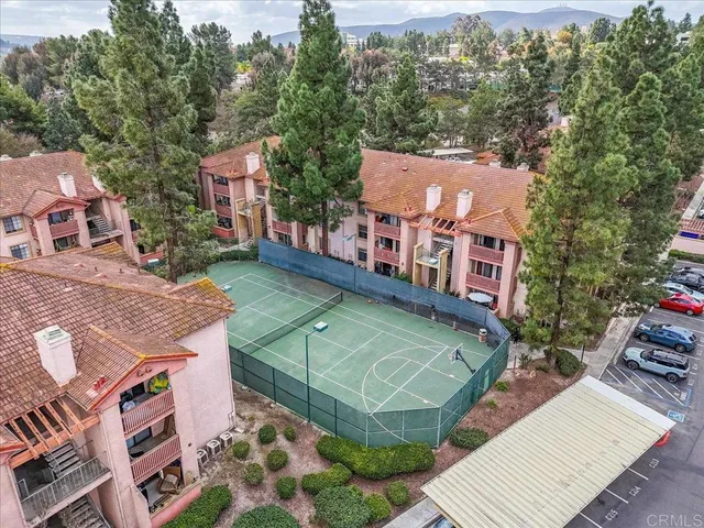 an aerial view of a house with a garden