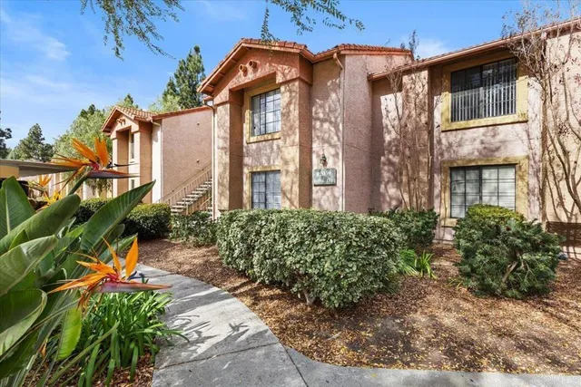 a view of a building with a garden