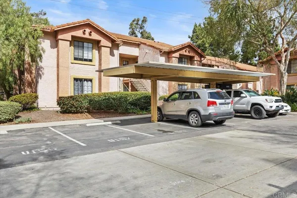 a view of street with parked cars