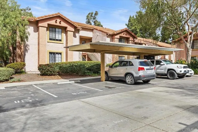 a view of street with parked cars