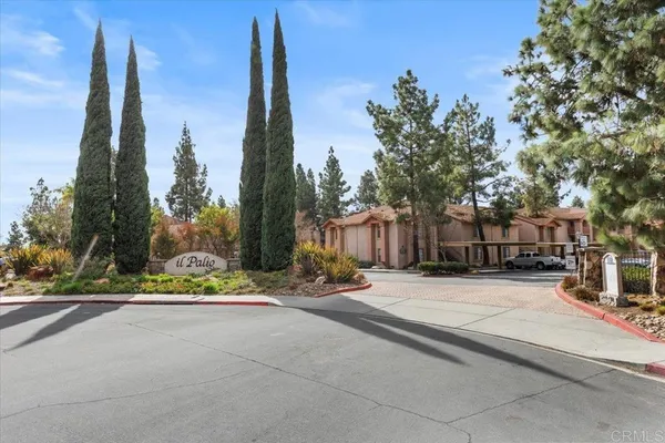 a view of a street sign of a house