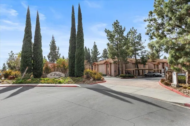 a view of a street sign of a house