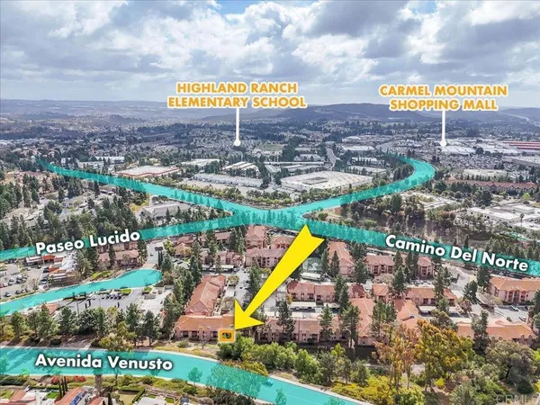 a view of a city with tall buildings