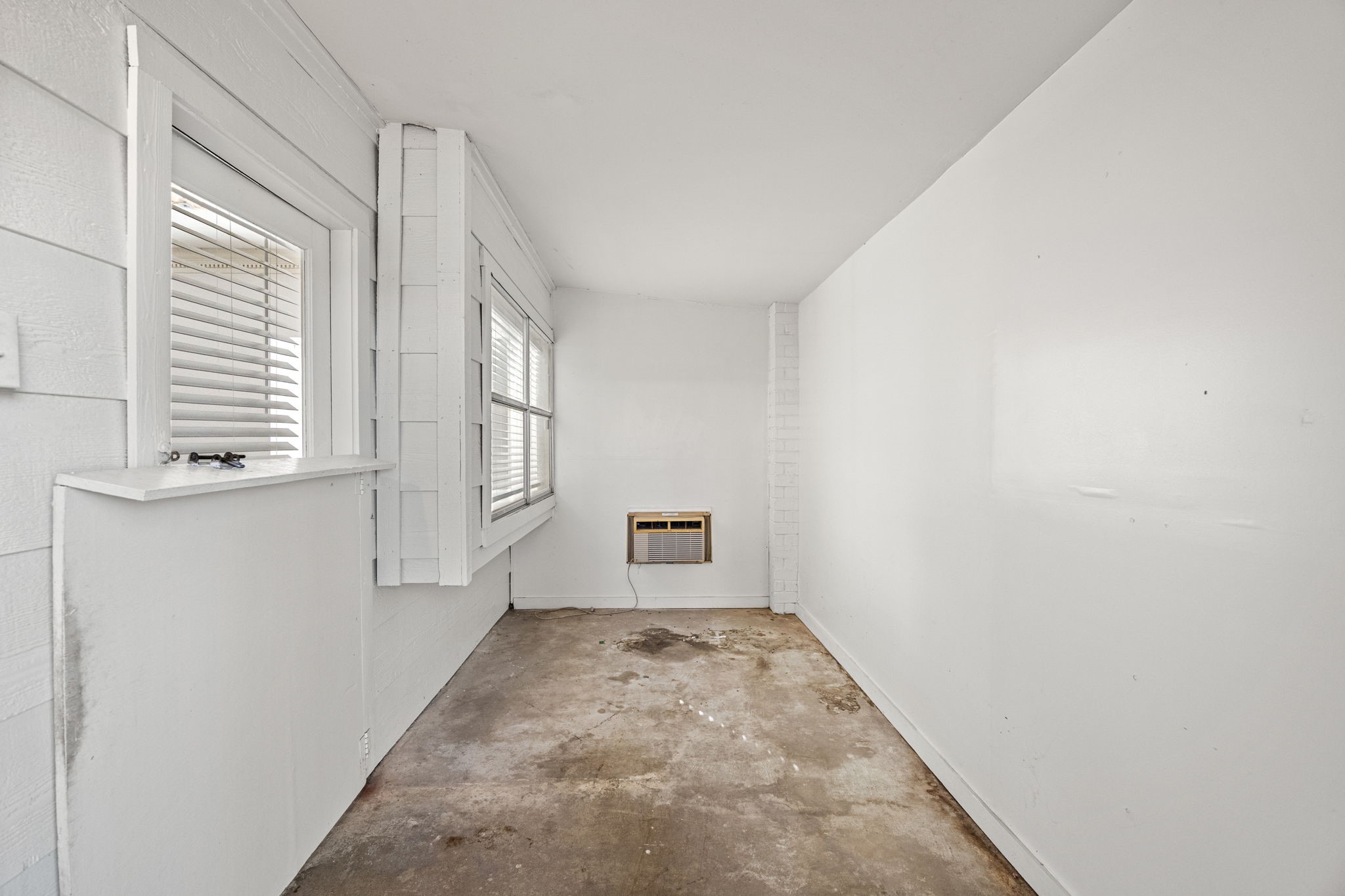 8043 Oceanside Drive Houston, TX 77095 - Photo 16 of 41 an empty room with windows