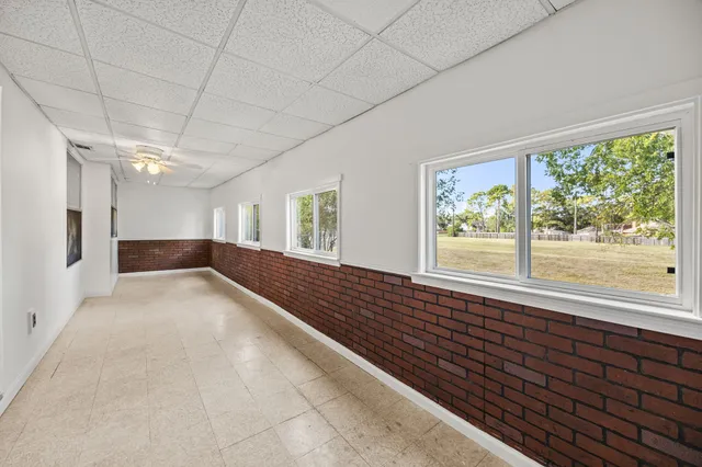 a view of hallway with a large window