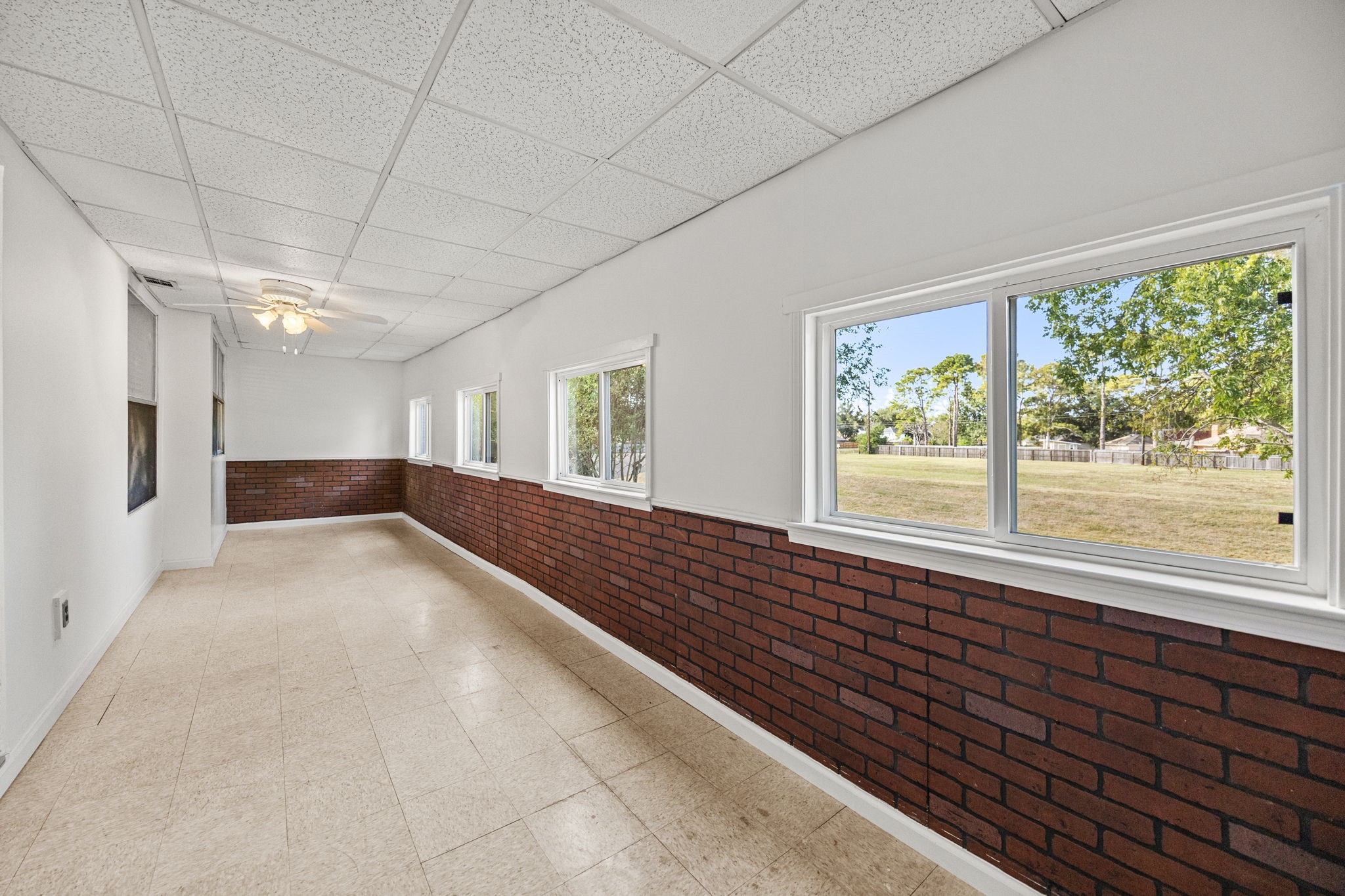8043 Oceanside Drive Houston, TX 77095 - Photo 23 of 41 a view of hallway with a large window