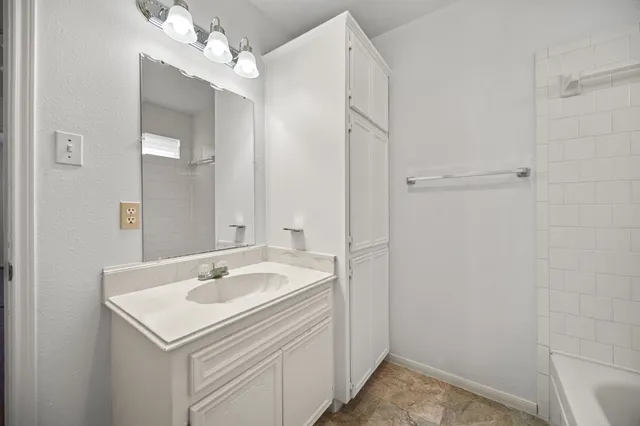 a view of a sink and a mirror