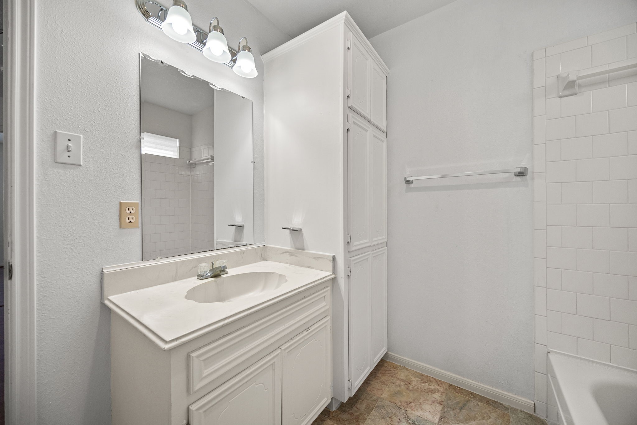 8043 Oceanside Drive Houston, TX 77095 - Photo 27 of 41 a view of a sink and a mirror
