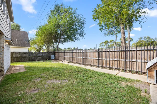 a view of backyard with green space