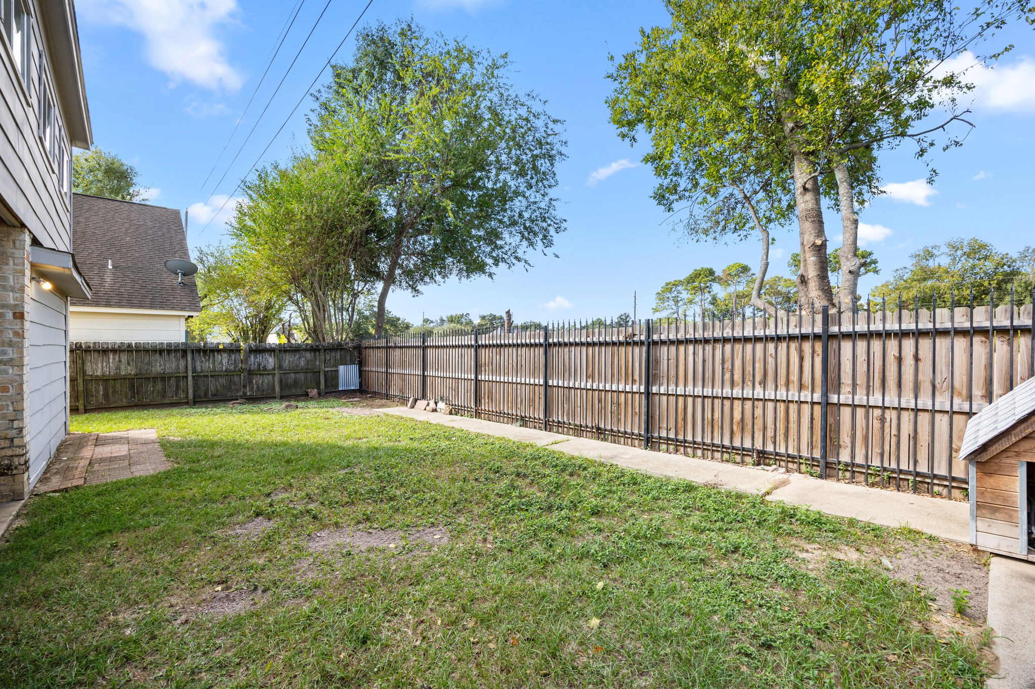 8043 Oceanside Drive Houston, TX 77095 - Photo 32 of 41 a view of backyard with green space