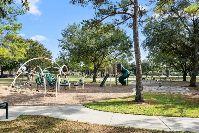 a view of a park with swings