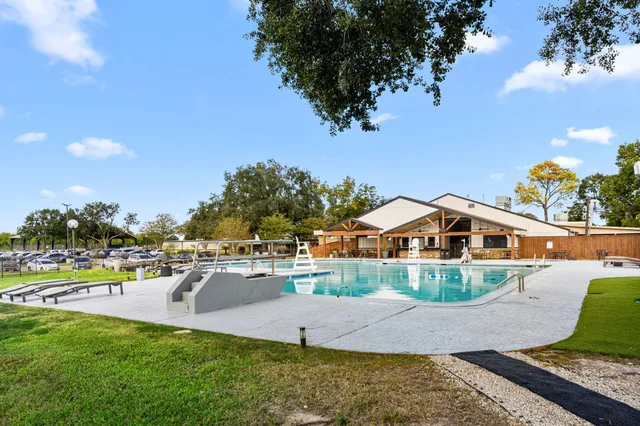 swimming pool view with a outdoor space