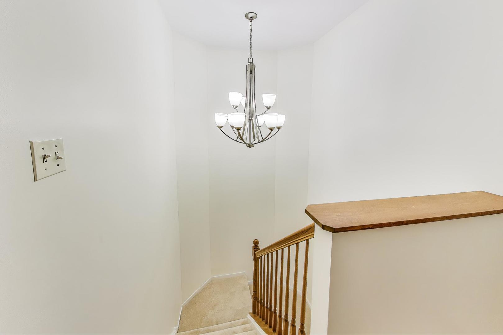 4 Haverton Court Streamwood, IL 60107 - Photo 11 of 30 a view of a hallway with windows